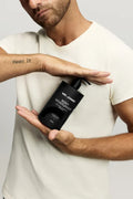 Men’s body moisturiser in sleek packaging, designed for daily hydration and smooth skin nourishment