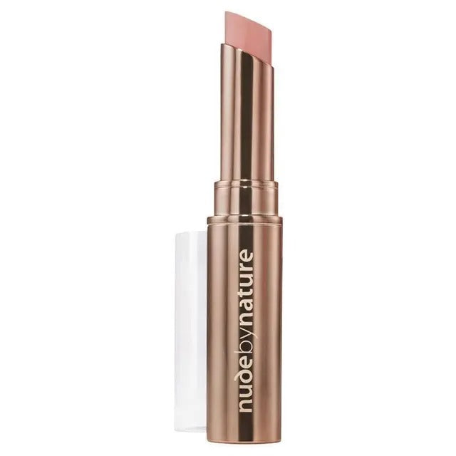 Lipstick with rose gold casing and 'Nude by Nature' branding on a white background