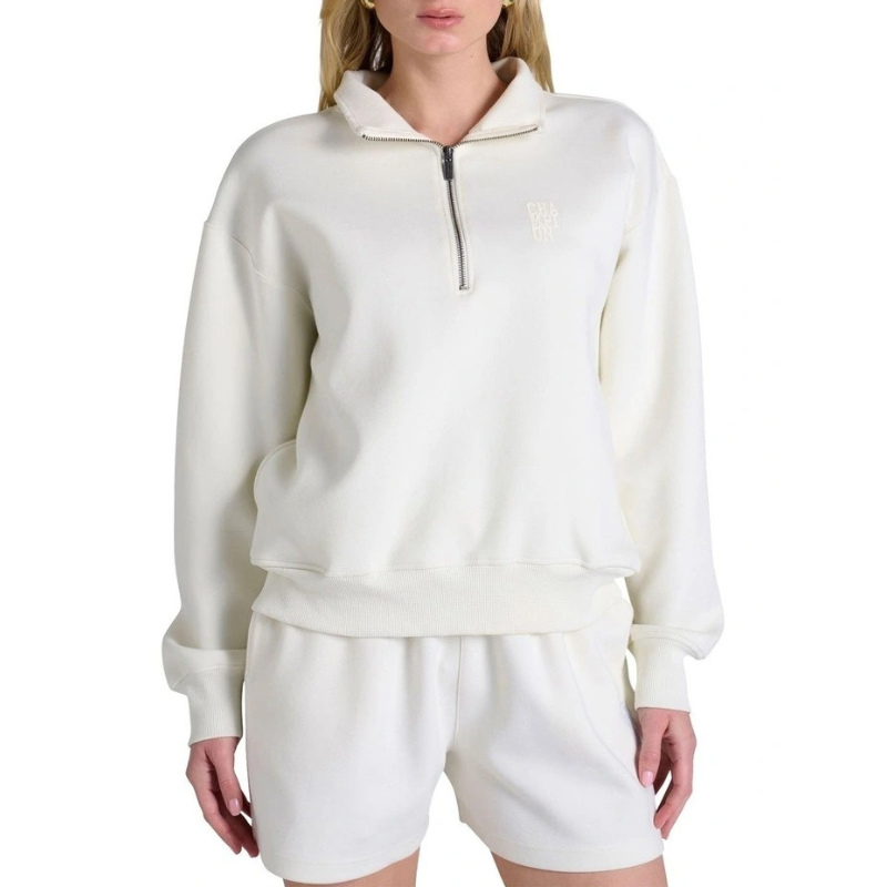 White fleece pullover with a quarter zip and shorts on a white background