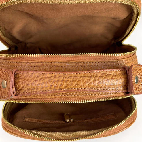 Premium leather women's handbag in satchel and shoulder bag style, featuring elegant stitching, durable handles, and a classic design for everyday and formal use.