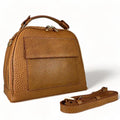 Premium leather women's handbag in satchel and shoulder bag style, featuring elegant stitching, durable handles, and a classic design for everyday and formal use.