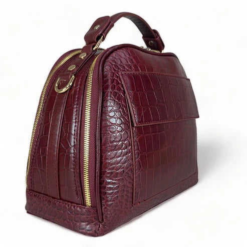 Red leather women's handbag – premium satchel and shoulder bag with elegant stitching, gold-tone hardware, and adjustable strap – luxury fashion accessory for women.