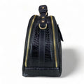 LeatherLuxe black leather women’s handbag – elegant crocodile-textured satchel bag with premium glossy finish and gold hardware.