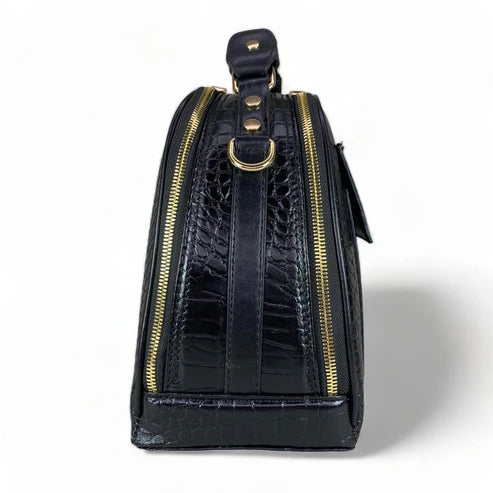 LeatherLuxe black leather women’s handbag – elegant crocodile-textured satchel bag with premium glossy finish and gold hardware.