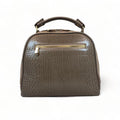 Elegant khaki leather handbag for women with shoulder strap and top handle, perfect for casual and formal outfits.