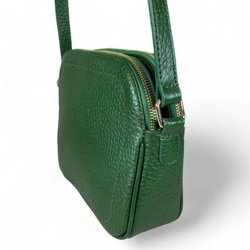 Elegant green leather women's shoulder bag by LeatherLuxe with crossbody strap, premium finish, and stylish modern design.