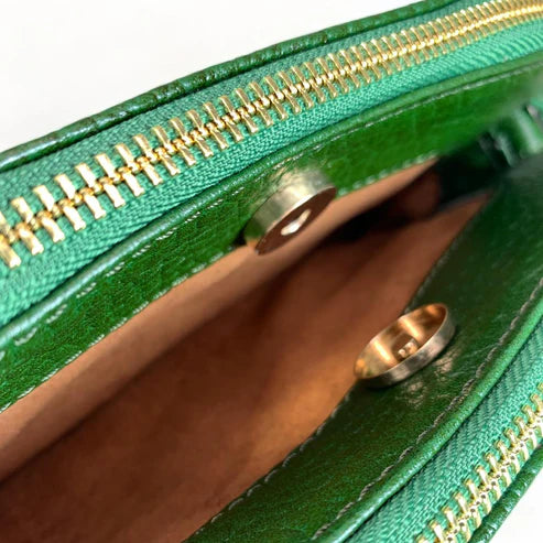 Elegant green leather women's shoulder bag by LeatherLuxe with crossbody strap, premium finish, and stylish modern design.
