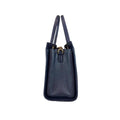 Navy blue women’s genuine leather handbag with shoulder and crossbody strap — elegant and stylish design for everyday use.