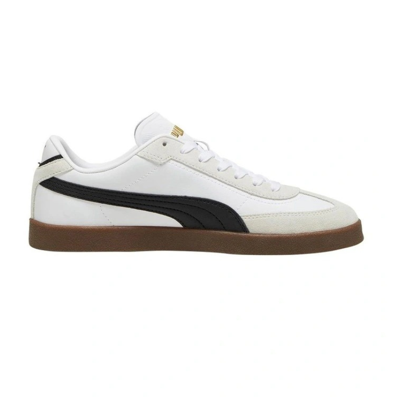 White sneaker with black accent and brown sole on a white background