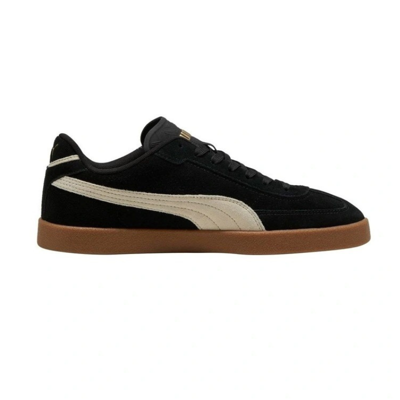 Black and white sneaker with brown sole on a white background