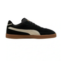 Black and white sneaker with brown sole on a white background