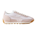 Beige sneaker with brown sole on a white background