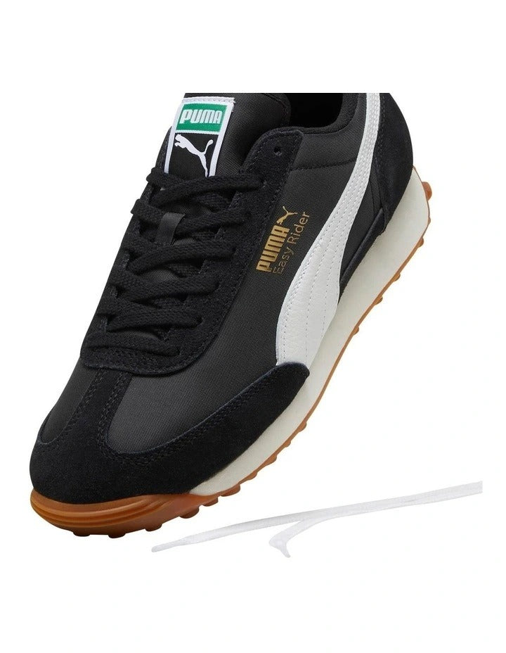 Puma Easy Rider Vintage Women’s Shoe with suede leather overlays, slim retro profile and low heel, casual lifestyle sneaker in leather and textile blend