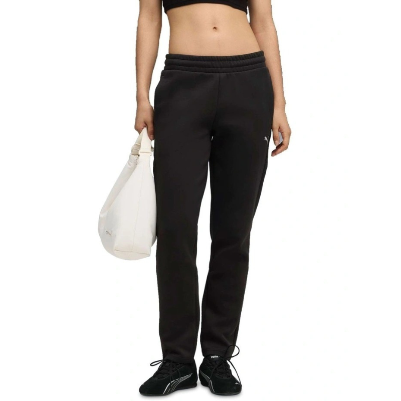 Person wearing black sweatpants on a white background
