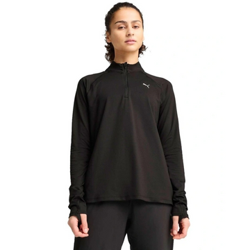 Person wearing a black long-sleeve athletic top with a brand logo on a white background