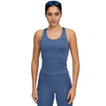 Woman wearing a blue athletic outfit with a Puma logo on a white background