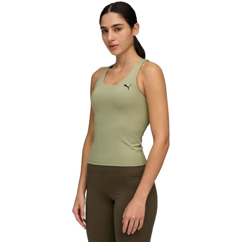 Woman wearing a green tank top with a brand logo on a white background