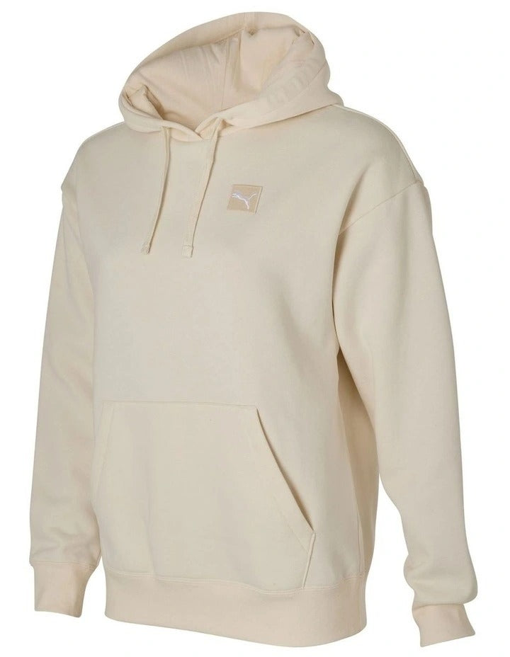 Beige hoodie with a small logo on the chest against a white background