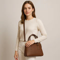 LeatherLuxe brown leather office bag with adjustable shoulder strap, durable stitching, and premium finish — stylish and functional for business and daily use.