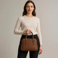 LeatherLuxe brown leather office bag with adjustable shoulder strap, durable stitching, and premium finish — stylish and functional for business and daily use.