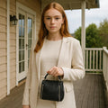 LeatherLuxe elegant black leather handbag for women – premium shoulder bag with sleek design and gold accents