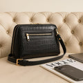 LeatherLuxe black leather clutch bag with detachable shoulder strap and crossbody option – elegant women’s evening handbag made of premium genuine leather.