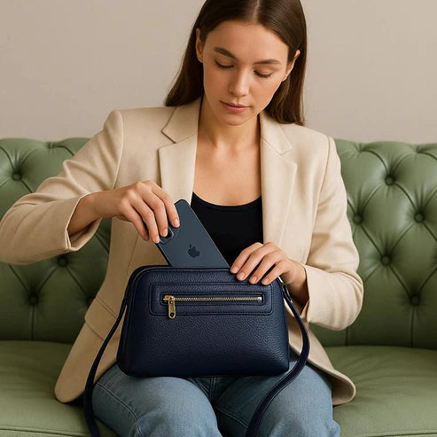 LeatherLuxe dark blue genuine leather clutch and shoulder crossbody bag with sleek design and gold-tone hardware