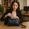 LeatherLuxe navy blue leather clutch bag and shoulder crossbody handbag for women – elegant, premium genuine leather design with adjustable strap and gold accents.