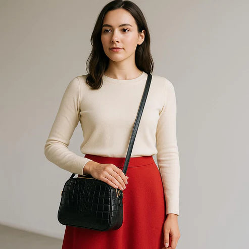 LeatherLuxe black leather women's shoulder bag and crossbody purse with sleek design and gold-tone hardware