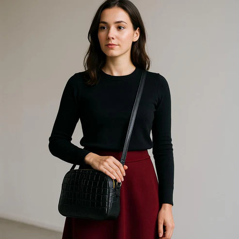 LeatherLuxe black leather women's shoulder bag and crossbody purse with sleek design and gold-tone hardware