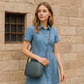 Elegant gray leather women’s shoulder bag and crossbody purse by LeatherLuxe — premium genuine leather handbag with adjustable strap and minimalist modern design.
