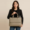 Premium cream leather laptop bag for men and women — stylish unisex business briefcase with shoulder strap, perfect for work, office, or travel.