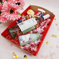 Purple Lavvish self-care gift box with skincare products, bath salts, soap bar, facial roller, and bath bomb displayed on purple floral background