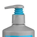 Close-up of a bottle with a pump and blue accents on a white background