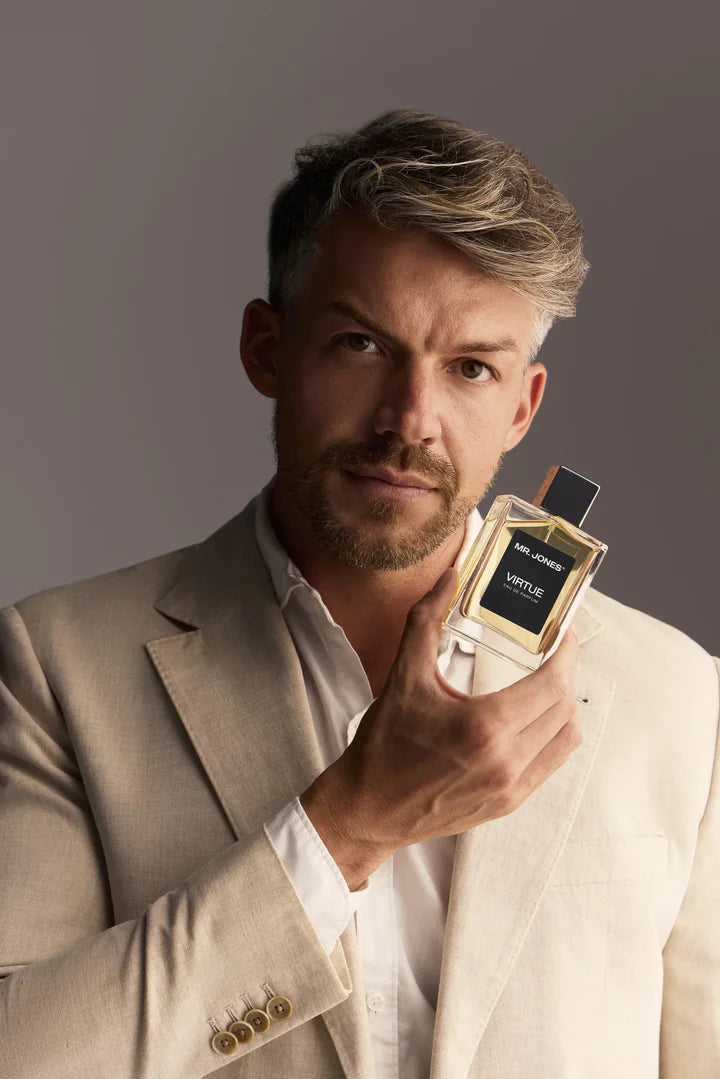 Virtue Eau De Parfum for men in sleek glass bottle with black label and cap, displayed with lifestyle shots and luxury background