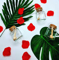 Lavvish Lavender and Rose Bath Salts in glass jar with wooden spoon and floral accents