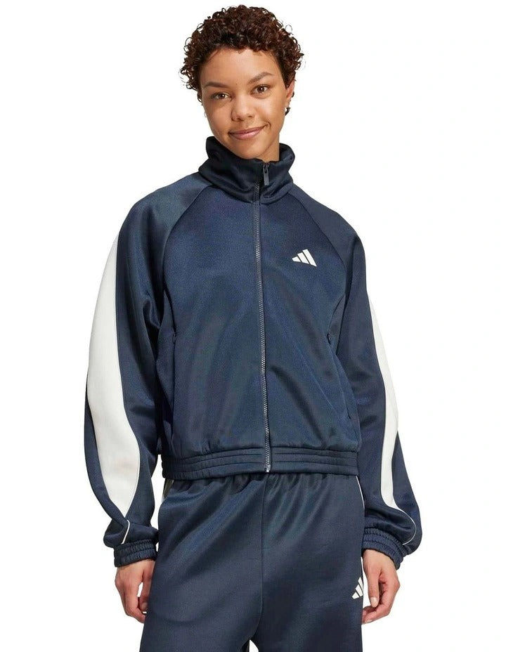 Adidas Stadium Tracktop with recycled polyester and cotton blend, soft knit fabric, satin piping, zip pockets, and 3 Bar Logo design