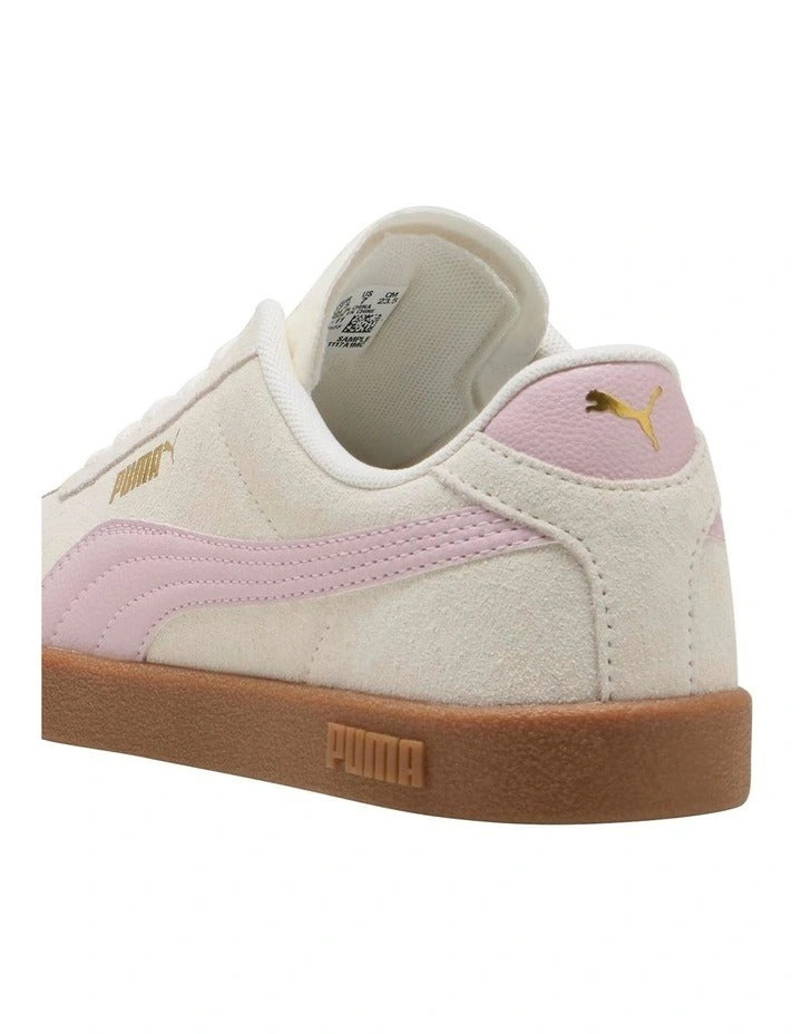 Puma sneaker with pink and white design on a white background