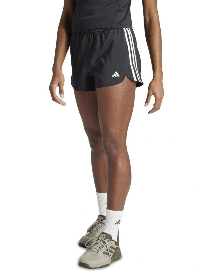 Adidas Pacer Training 3-Stripes Woven High-Rise Shorts for women in black, lightweight recycled polyester with AEROREADY moisture control and elastic waistband