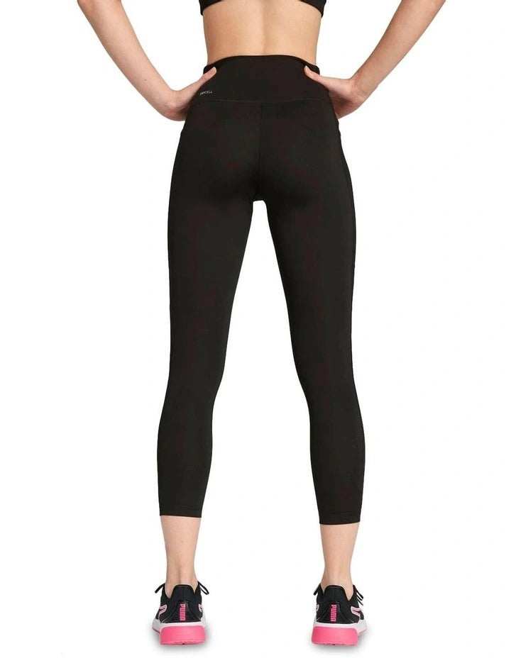 Black leggings worn by a person on a white background