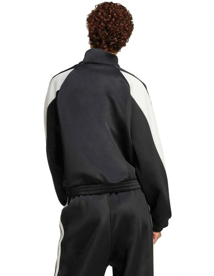 Adidas Stadium Track Top for men in soft knit with satin piping, zip pockets, and 3 Bar Logo – 67% recycled polyester, 33% cotton