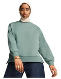 Puma Wardrobe Essentials Oversized Crew Sweatshirt in cotton-polyester blend with centered logo and ribbed cuffs
