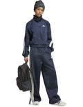 Adidas Stadium Tracktop with recycled polyester and cotton blend, soft knit fabric, satin piping, zip pockets, and 3 Bar Logo design