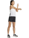 Adidas Run It Shorts for women made with recycled polyester, lightweight breathable fabric with Aeroready moisture control and reflective details.