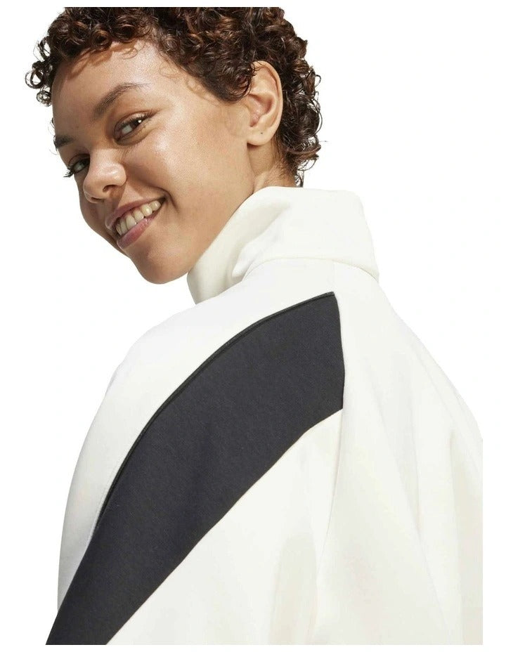 Adidas Stadium Track Top with recycled polyester cotton blend, zip pockets, and 3 Bar Logo