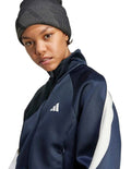 Adidas Stadium Tracktop with recycled polyester and cotton blend, soft knit fabric, satin piping, zip pockets, and 3 Bar Logo design