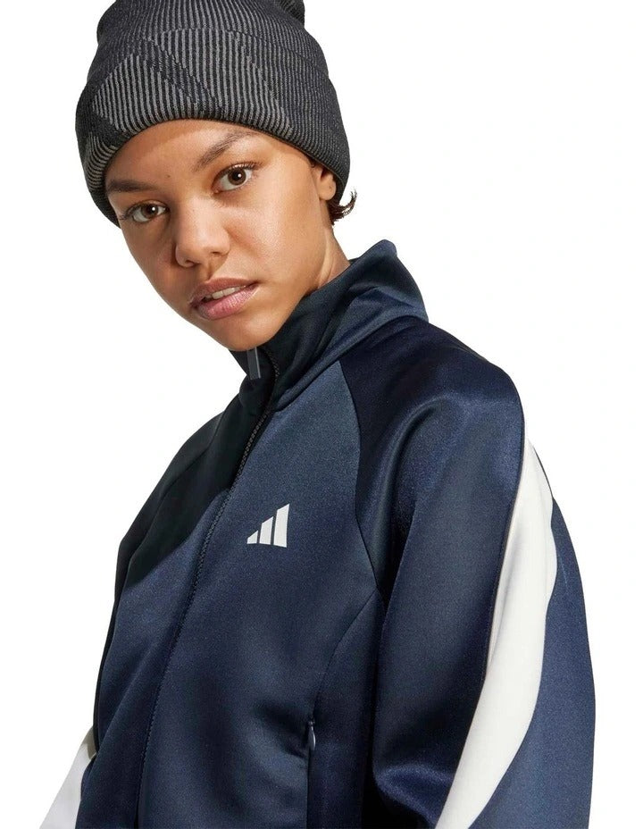 Adidas Stadium Tracktop with recycled polyester and cotton blend, soft knit fabric, satin piping, zip pockets, and 3 Bar Logo design