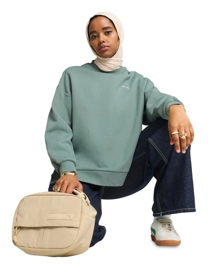 Puma Wardrobe Essentials Oversized Crew Sweatshirt in cotton-polyester blend with centered logo and ribbed cuffs