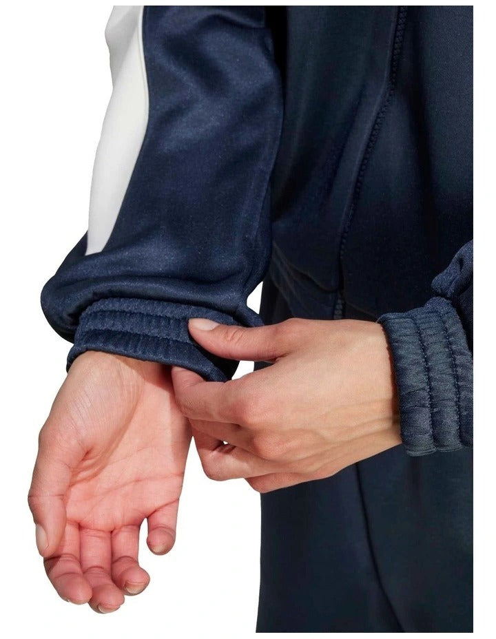 Adidas Stadium Tracktop with recycled polyester and cotton blend, soft knit fabric, satin piping, zip pockets, and 3 Bar Logo design