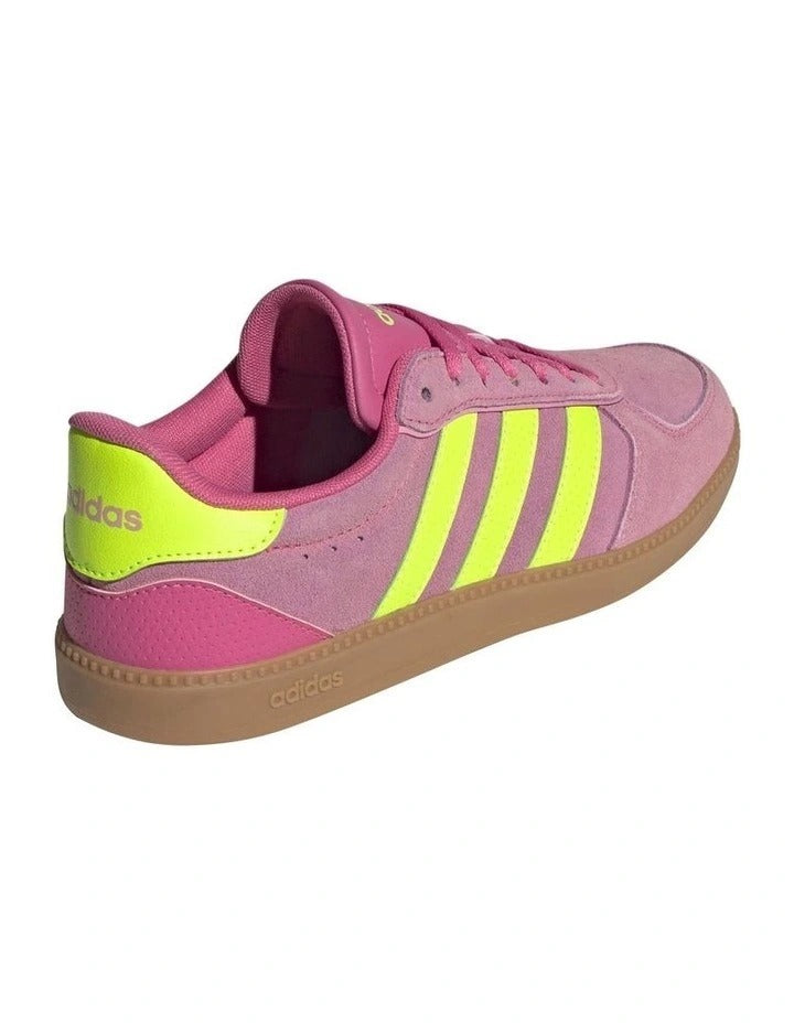 Adidas Breaknet Sleek women’s shoes with low heel, leather and synthetic upper, perforated design, and classic 3-Stripes on rubber outsole